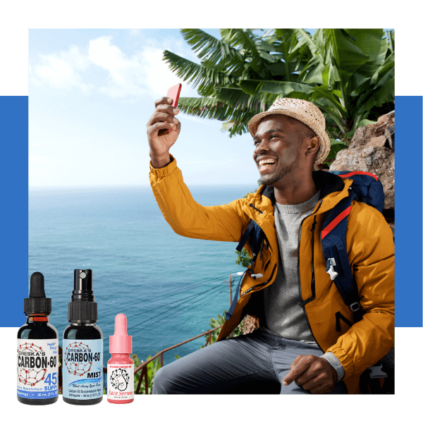 smiling man taking a selfie with Carbon 60 bottles